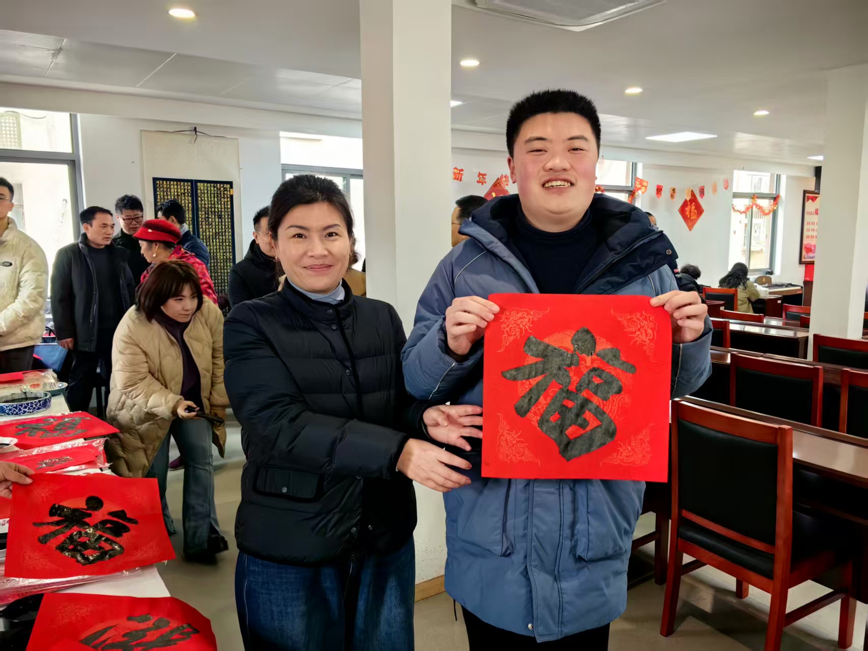“笔墨传情迎新春 残健共融暖万家”迎春送福下基层活动温情启幕